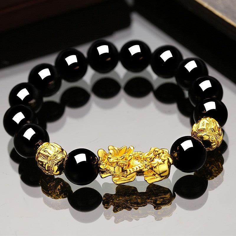 Embrace the spirit of Vietnam with our Sand Gold Brave Bracelet, a unisex piece featuring obsidian for a touch of exotic elegance.