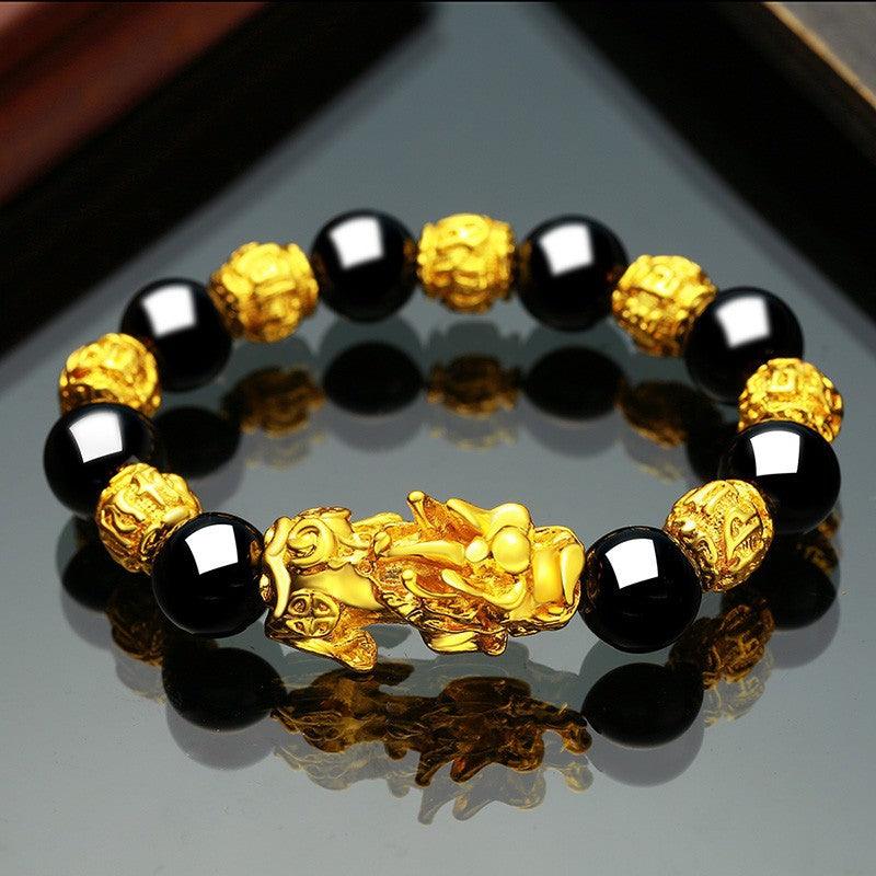 Embrace the spirit of Vietnam with our Sand Gold Brave Bracelet, a unisex piece featuring obsidian for a touch of exotic elegance. - Bloomjay