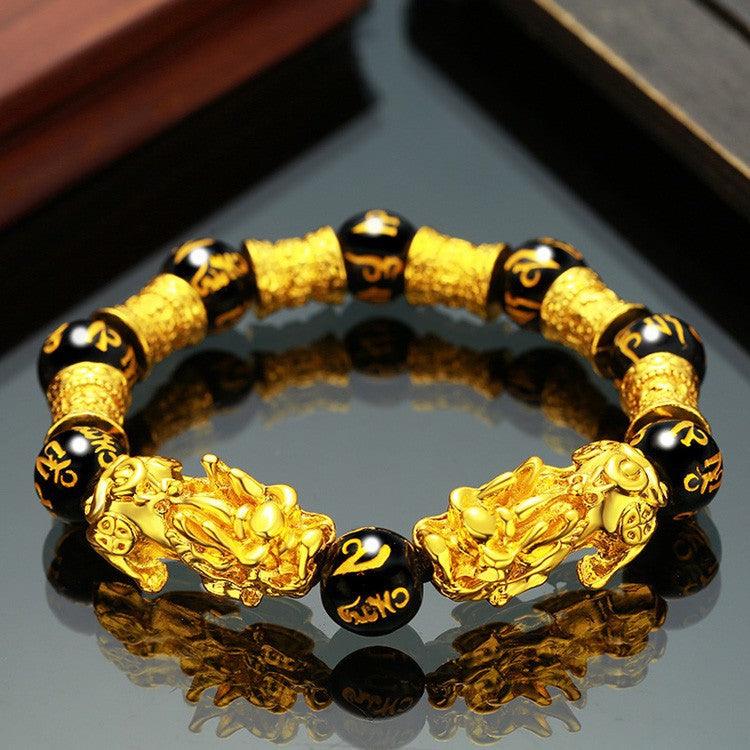 Embrace the spirit of Vietnam with our Sand Gold Brave Bracelet, a unisex piece featuring obsidian for a touch of exotic elegance. - Bloomjay