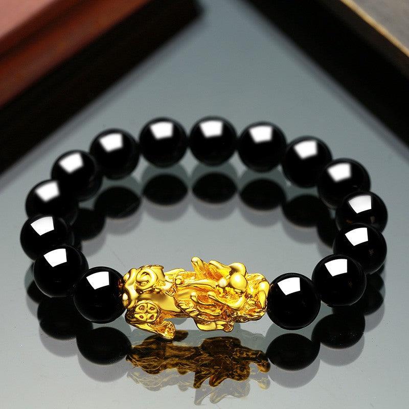 Embrace the spirit of Vietnam with our Sand Gold Brave Bracelet, a unisex piece featuring obsidian for a touch of exotic elegance. - Bloomjay