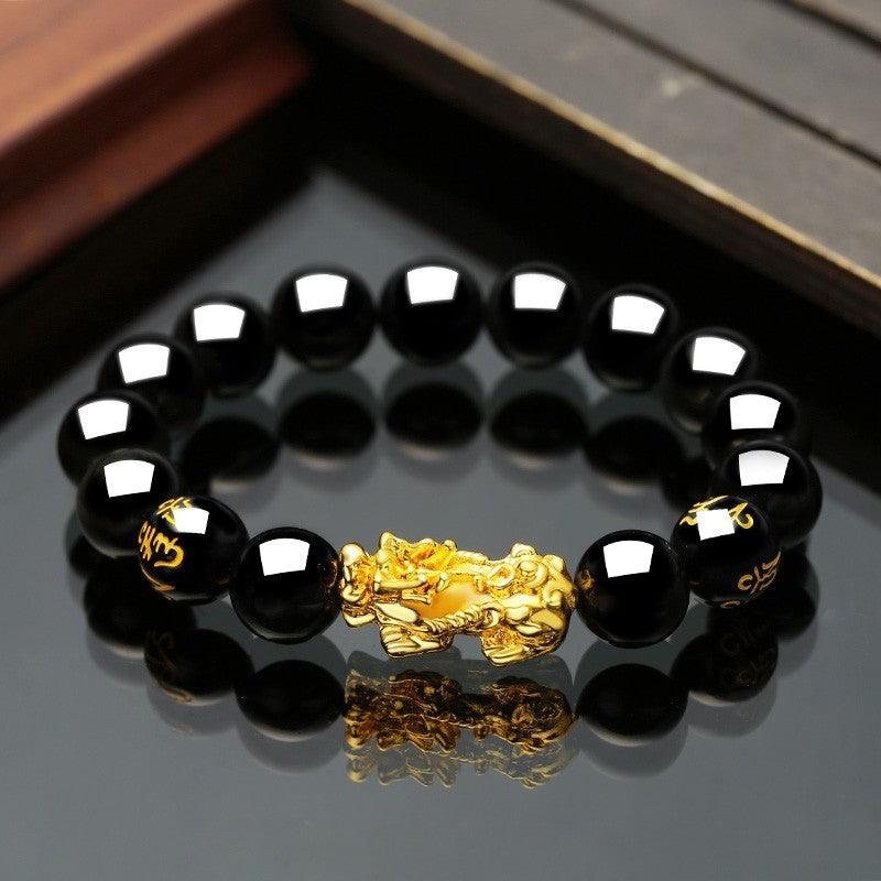 Embrace the spirit of Vietnam with our Sand Gold Brave Bracelet, a unisex piece featuring obsidian for a touch of exotic elegance. - Bloomjay