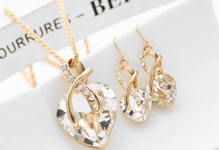 Adorn your ears with elegance in our heart-shaped faux Austrian crystal zircon earrings. - Bloomjay