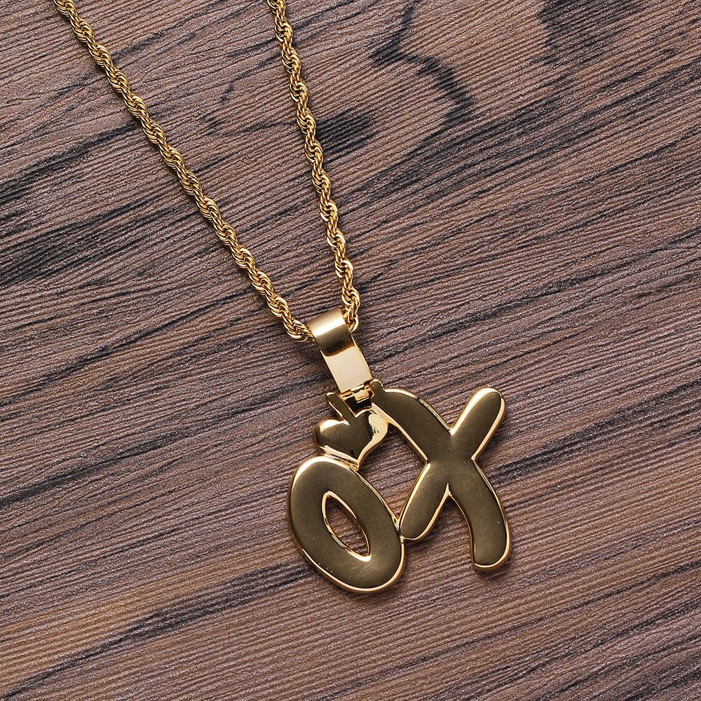 Enhance your style with our Copper XO Pendant Necklace, featuring intricate zircon inlay for a touch of elegance and charm. - Bloomjay
