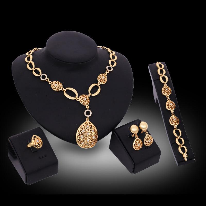 Complete your look with our four-piece Jewelry Fashion Set, featuring a necklace, earrings, bracelet, and ring. - Bloomjay