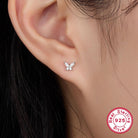 Add a touch of elegance with these IG-style butterfly ear studs, featuring sterling silver, zircon stones, and 18k gold or white gold plating.