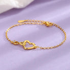 Adorn your wrist with our Heart-shaped Bracelet, a versatile piece of love jewelry.