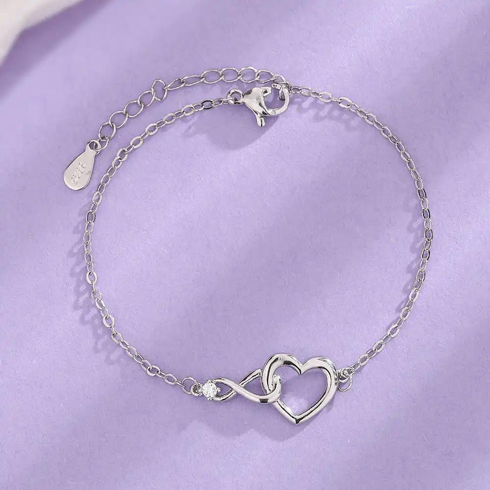 Adorn your wrist with our Heart-shaped Bracelet, a versatile piece of love jewelry.