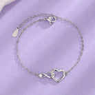 Adorn your wrist with our Heart-shaped Bracelet, a versatile piece of love jewelry.