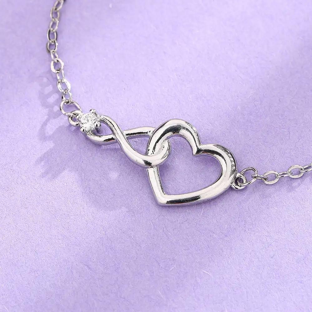 Adorn your wrist with our Heart-shaped Bracelet, a versatile piece of love jewelry.