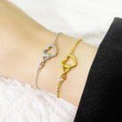 Adorn your wrist with our Heart-shaped Bracelet, a versatile piece of love jewelry.