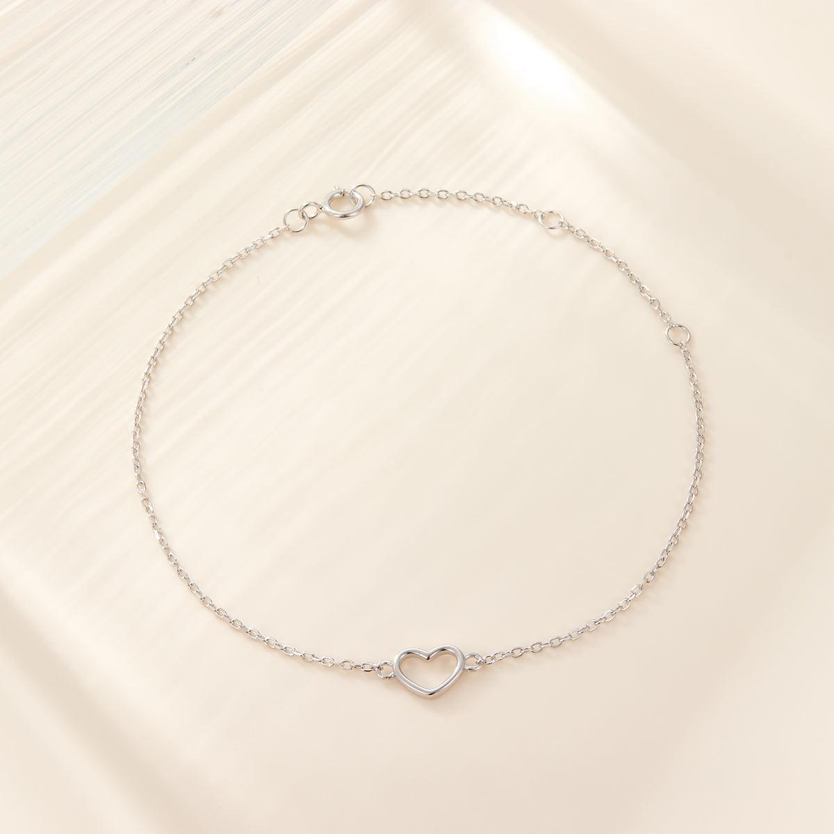 Adorn your wrist with sophistication using these heart-shaped bracelets crafted from sterling silver and plated in 18k gold or white gold.