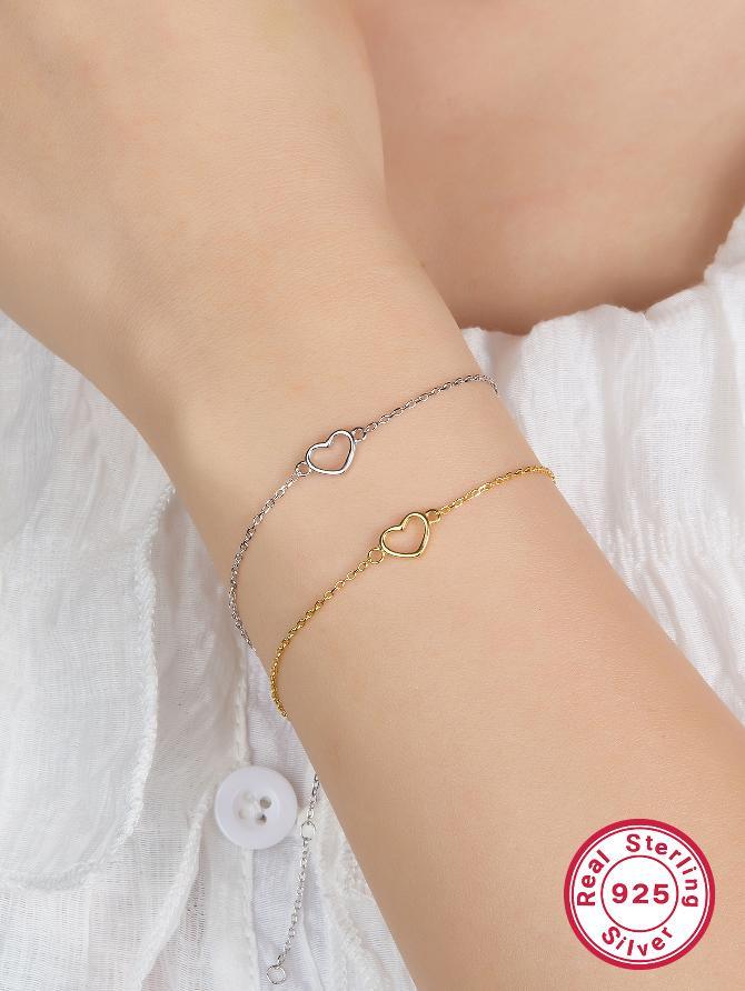 Adorn your wrist with sophistication using these heart-shaped bracelets crafted from sterling silver and plated in 18k gold or white gold.