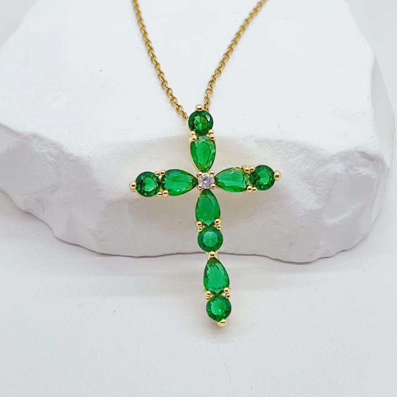 Adorn yourself with our Fashion Jewelry Micro Inlay Colorful Zircon Water Drops Cross Necklace for a vibrant and stylish accessory.