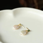 Adorn yourself with the natural beauty of Freshwater Baroque Pearl Earrings, a timeless and elegant accessory.