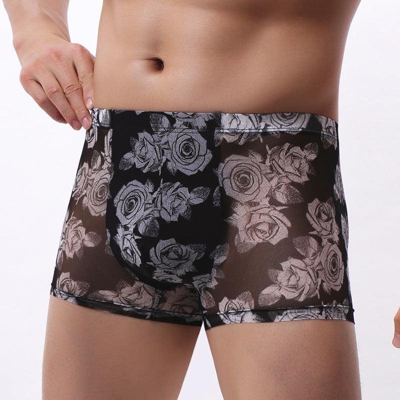 Comfort and style come together in our Men's Underwear Mesh Boxer Rose Printed Boxers.