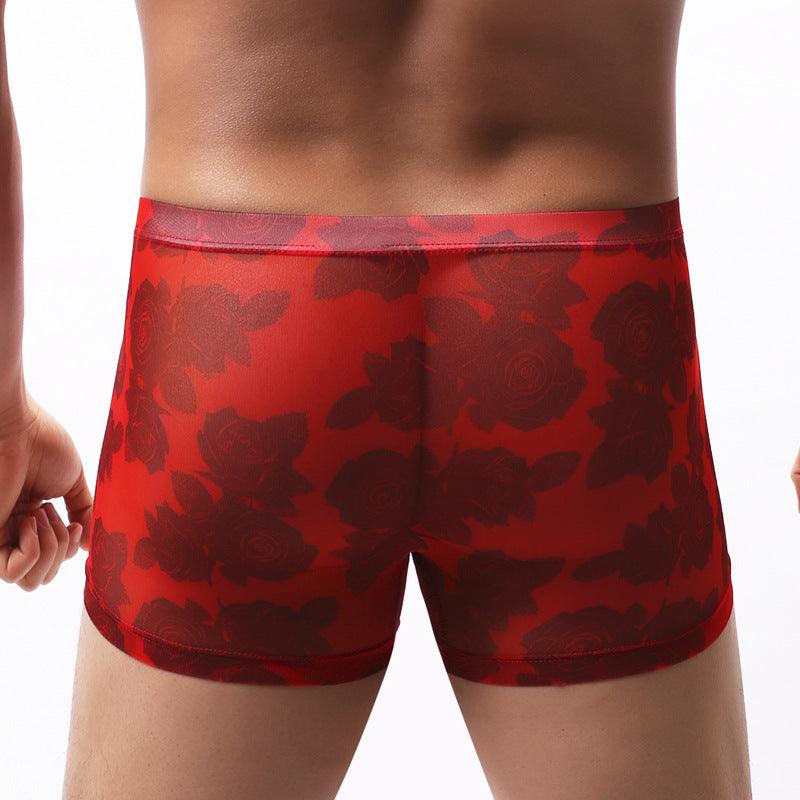 Comfort and style come together in our Men's Underwear Mesh Boxer Rose Printed Boxers.