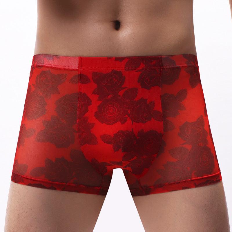 Comfort and style come together in our Men's Underwear Mesh Boxer Rose Printed Boxers.