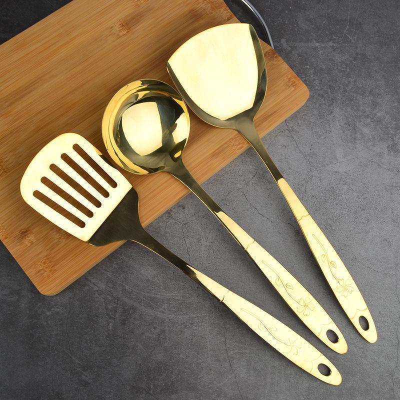 "Copper Kitchen Utensil Set: Spoon, Spatula, Colander, Frying Spatula."