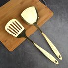 "Copper Kitchen Utensil Set: Spoon, Spatula, Colander, Frying Spatula."