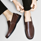 Cowhide Loafers Men's British Business Dress Slip-on Hollowed-out Breathable Leather Shoes.