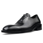 Crafted Excellence: Handmade Leather Shoes for the Discerning Gentleman's Business Attire.