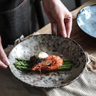 Creative ceramic dishes with a unique and unconventional design, perfect for home use.