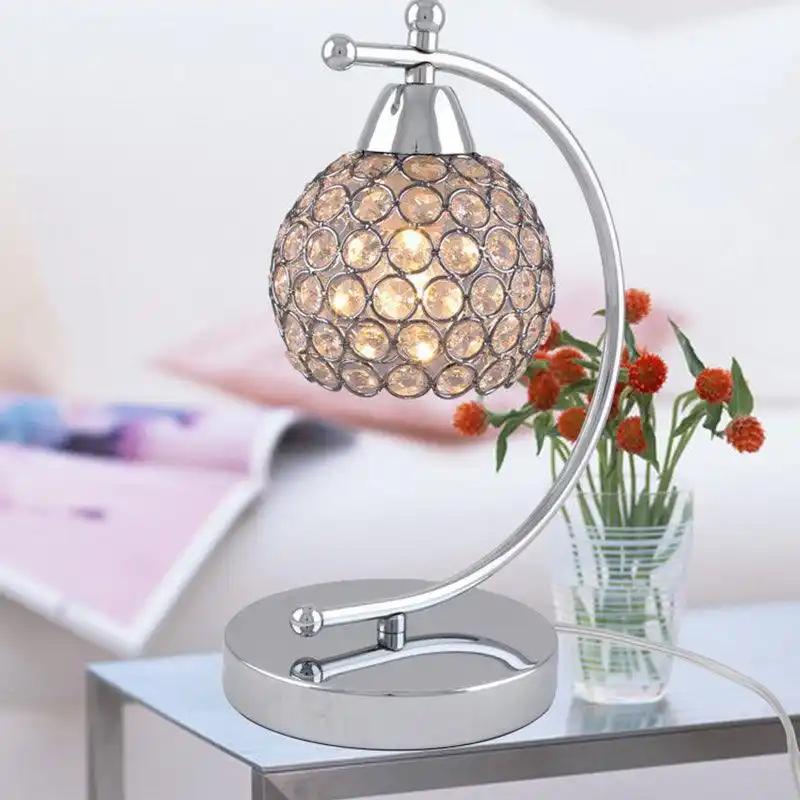 Crystal lamp: featuring a sleek design and crystal accents.