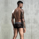 Discover the perfect combination of allure and style with our Black Lace See-through Men's Boxers.