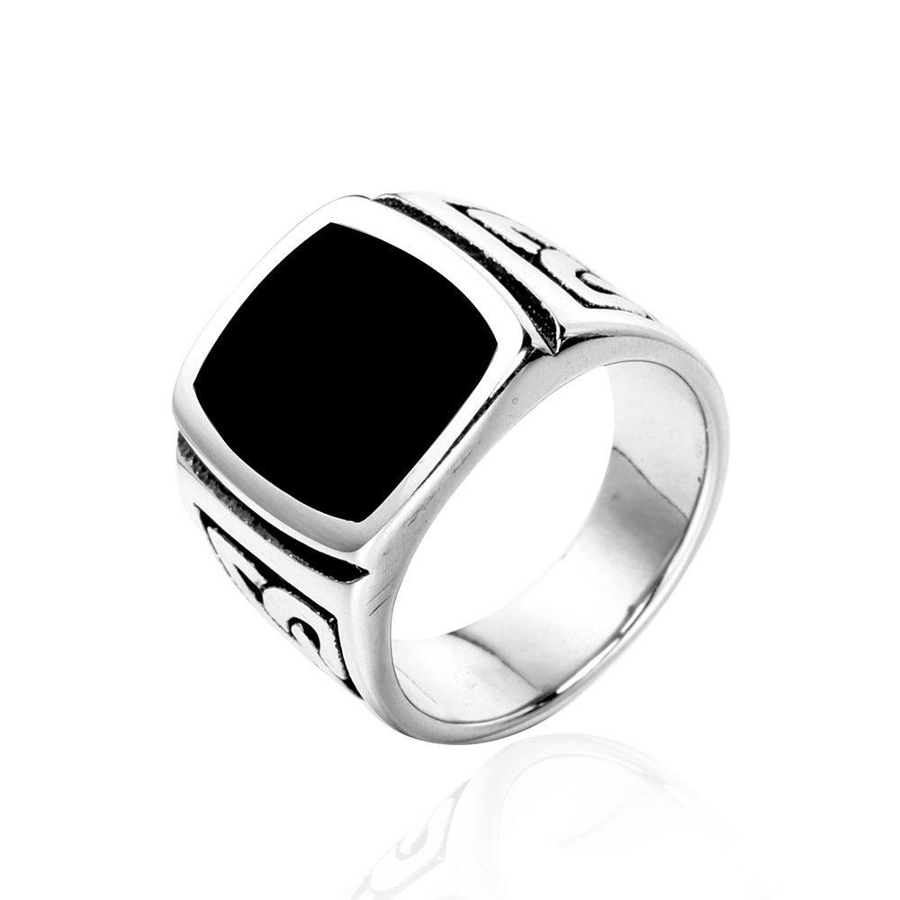 Discover timeless elegance with our vintage men's ring, featuring a sophisticated black dripping design.