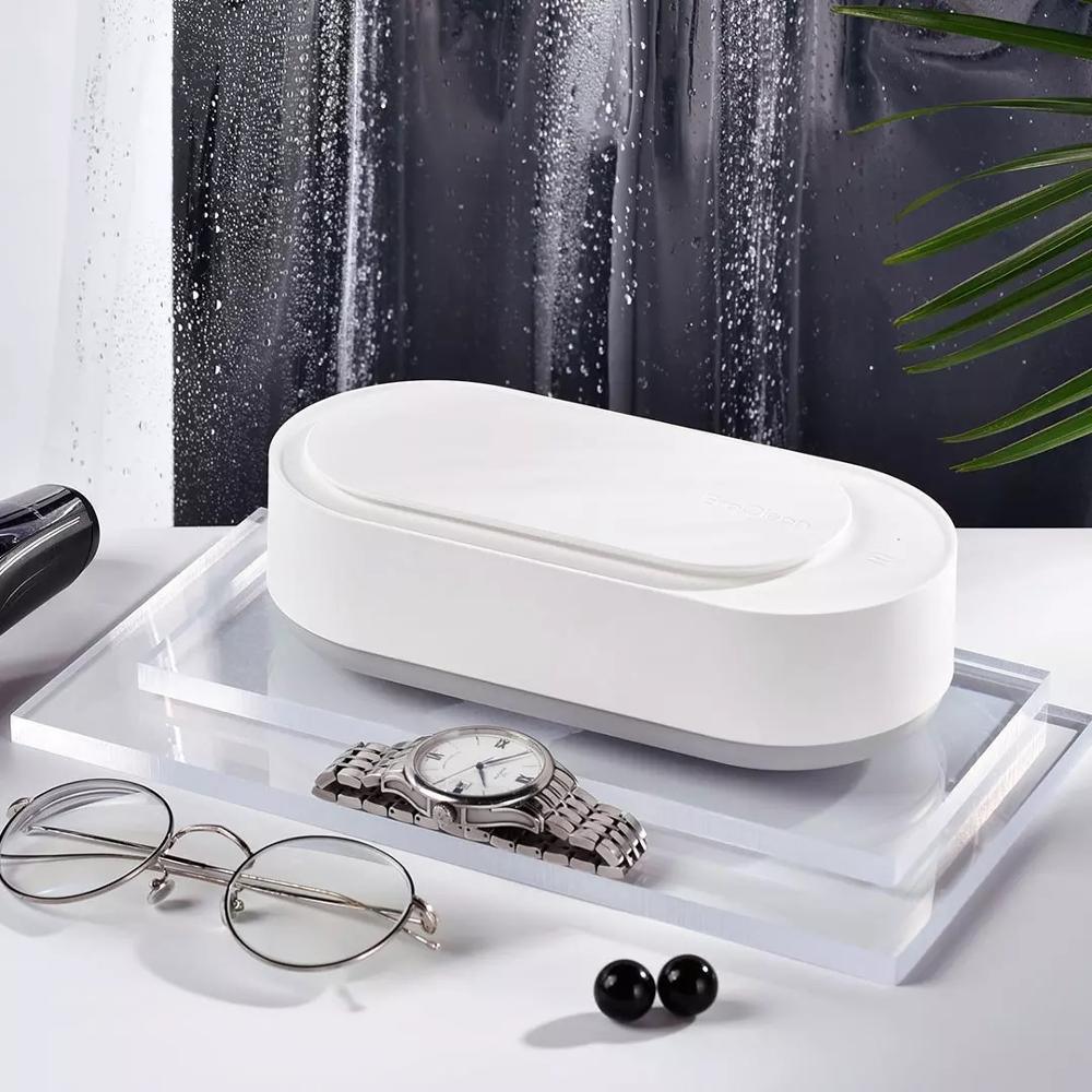 Effortlessly clean jewelry, glasses, and watches with our Portable Ultrasonic Cleaner featuring high-frequency vibration at 45,000Hz for effective results.