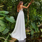 Eightree presents a stunning A-Line Wedding Dress with a sexy side slit, Boho beading, spaghetti straps, lace appliques, and a backless design in chiffon.