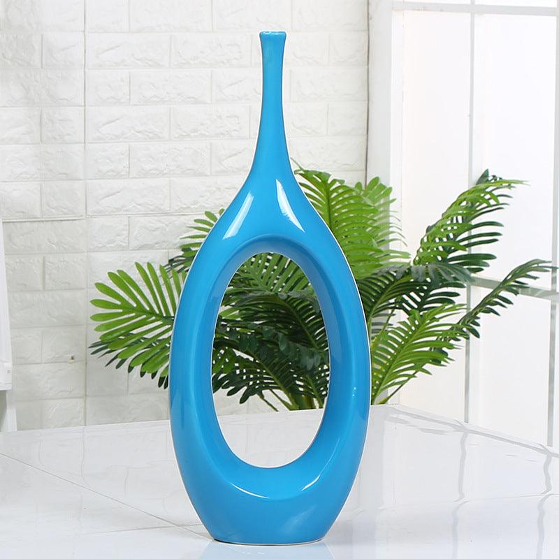 Elevate your home décor with our intricate hollow ceramic vase