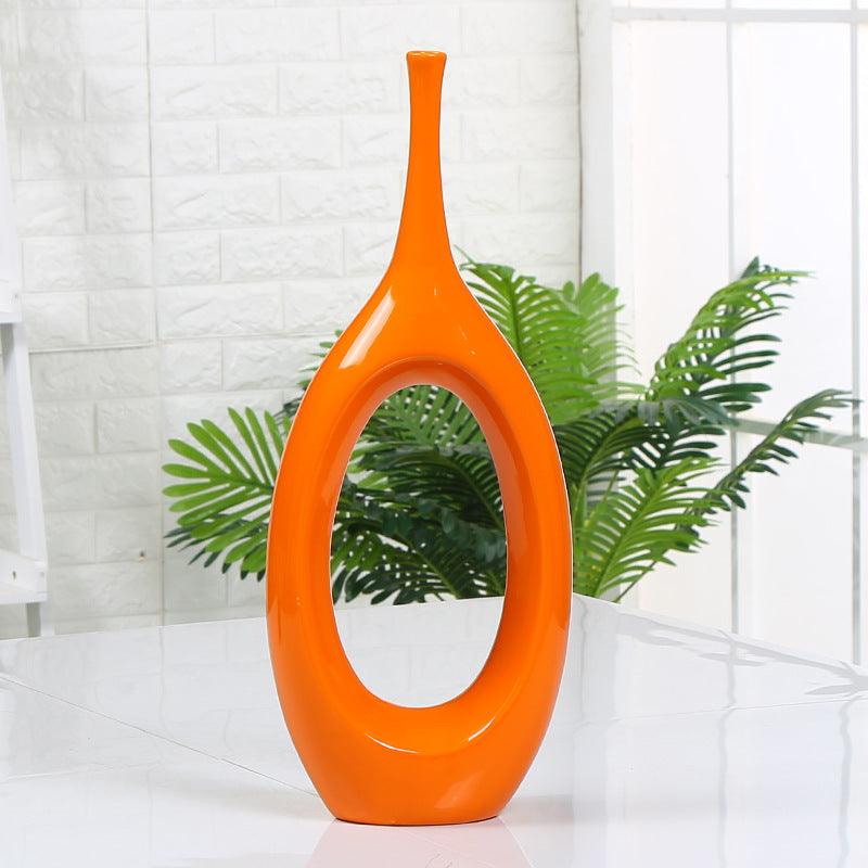 Elevate your home décor with our intricate hollow ceramic vase