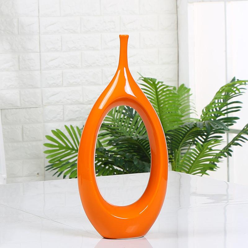 Elevate your home décor with our intricate hollow ceramic vase