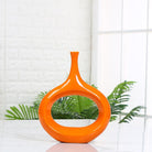 Elevate your home décor with our intricate hollow ceramic vase