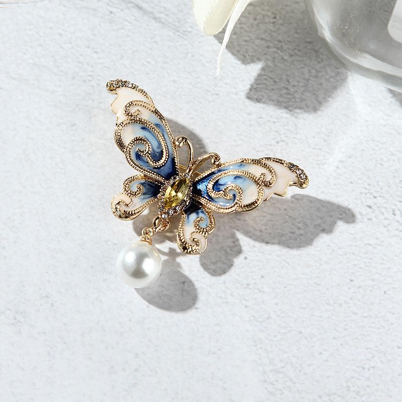 Elevate your style with our Butterfly Brooch, a charming and elegant addition to your jewelry collection.