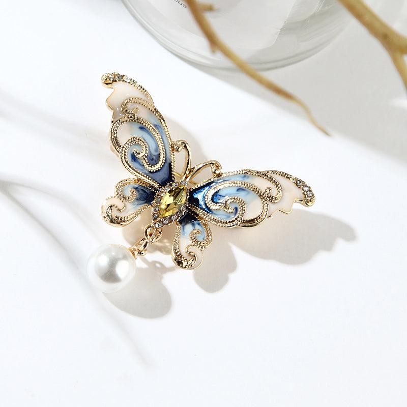 Elevate your style with our Butterfly Brooch, a charming and elegant addition to your jewelry collection.