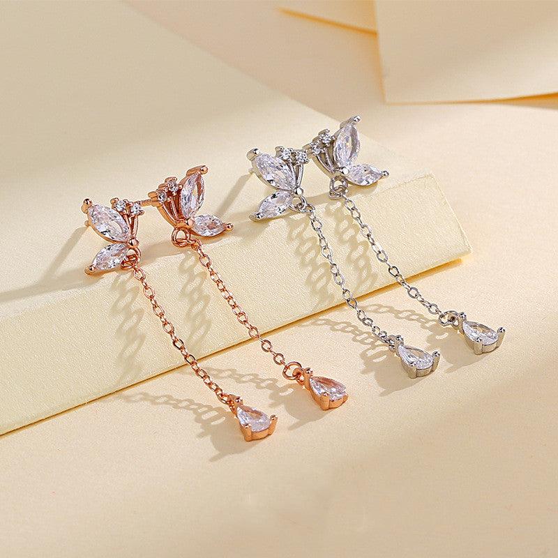 Elevate your style with our S925 Butterfly Zircon Tassel Earrings – a blend of elegance and sophistication for the modern woman.