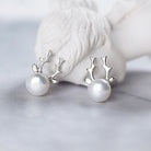 Enhance your elegance with our S925 silver pearl earrings, a refined jewelry choice for a touch of sophistication.