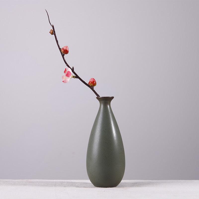 Enhance your home décor with our green hydroponic vase, perfect for adding a touch of tranquility to your space or as an elegant addition to your tea ceremony setup.