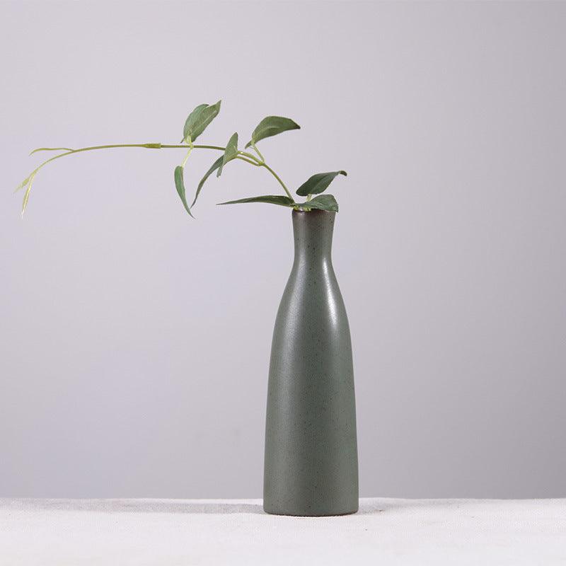 Enhance your home décor with our green hydroponic vase, perfect for adding a touch of tranquility to your space or as an elegant addition to your tea ceremony setup.