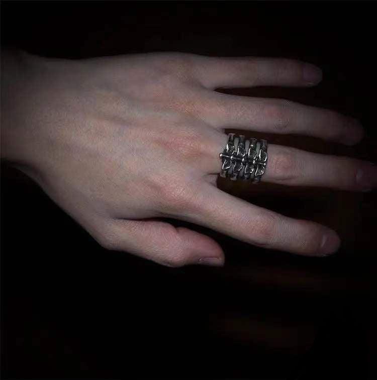 Explore creativity in fashion with our Rib Alloy Bone Ring for men, a unique and stylish jewelry piece.