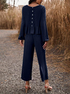 Exude charm in our Temperament Casual Suit featuring a solid-color, long-sleeved top paired with loose trousers for a stylish and relaxed ensemble