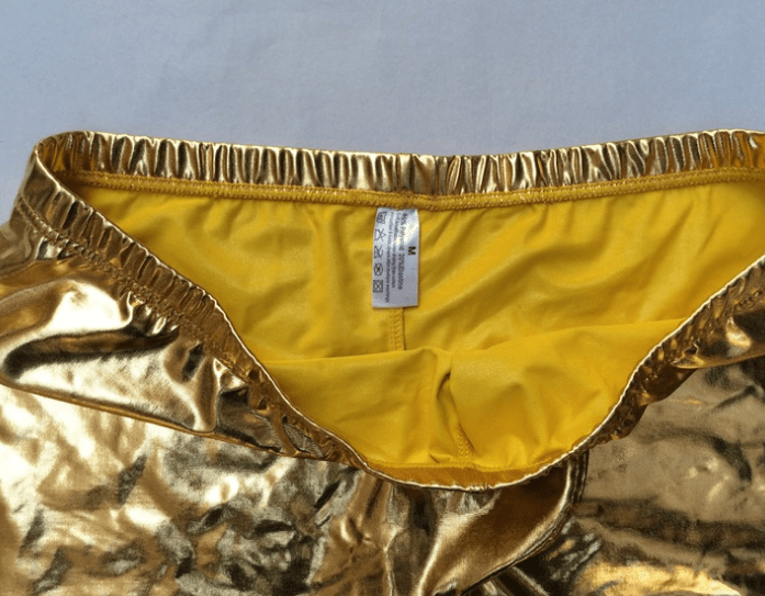 ndulge in luxury with our men's sexy golden/silver underwear collection.