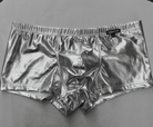 ndulge in luxury with our men's sexy golden/silver underwear collection.