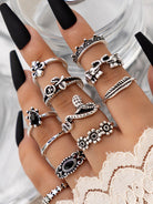 Jewelry 15-piece ring personality hollow lotus sunflower geometric black stone set ring