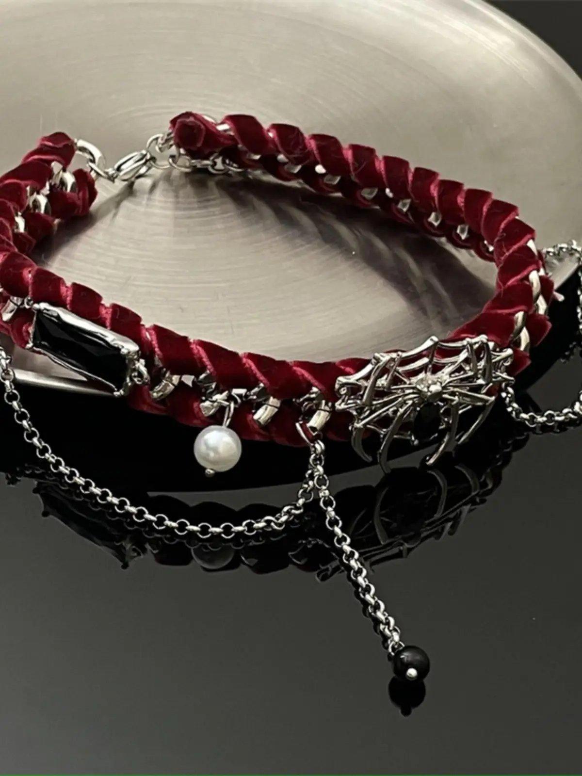 Necklace: Indulge in elegance with our vintage red spider web necklace.