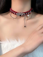 Necklace: Indulge in elegance with our vintage red spider web necklace.