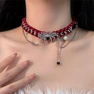 Necklace: Indulge in elegance with our vintage red spider web necklace.