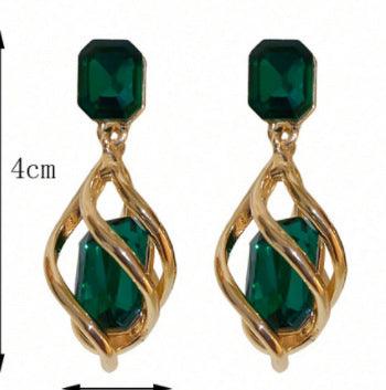 Revive your style with our Retro Emerald Stud Earrings for a touch of creative and fashionable flair.